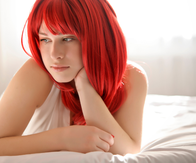 Foto de mulher com cabelo vermelho