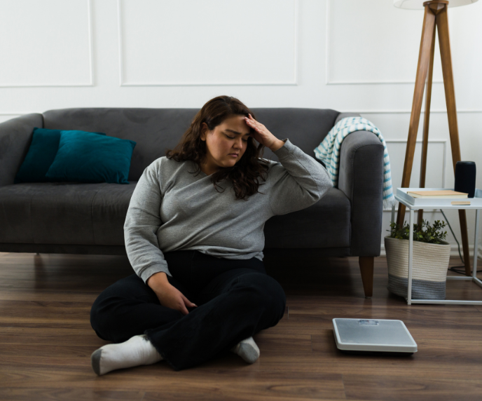 Foto de mulher achando dif&iacute;cil emagrecer